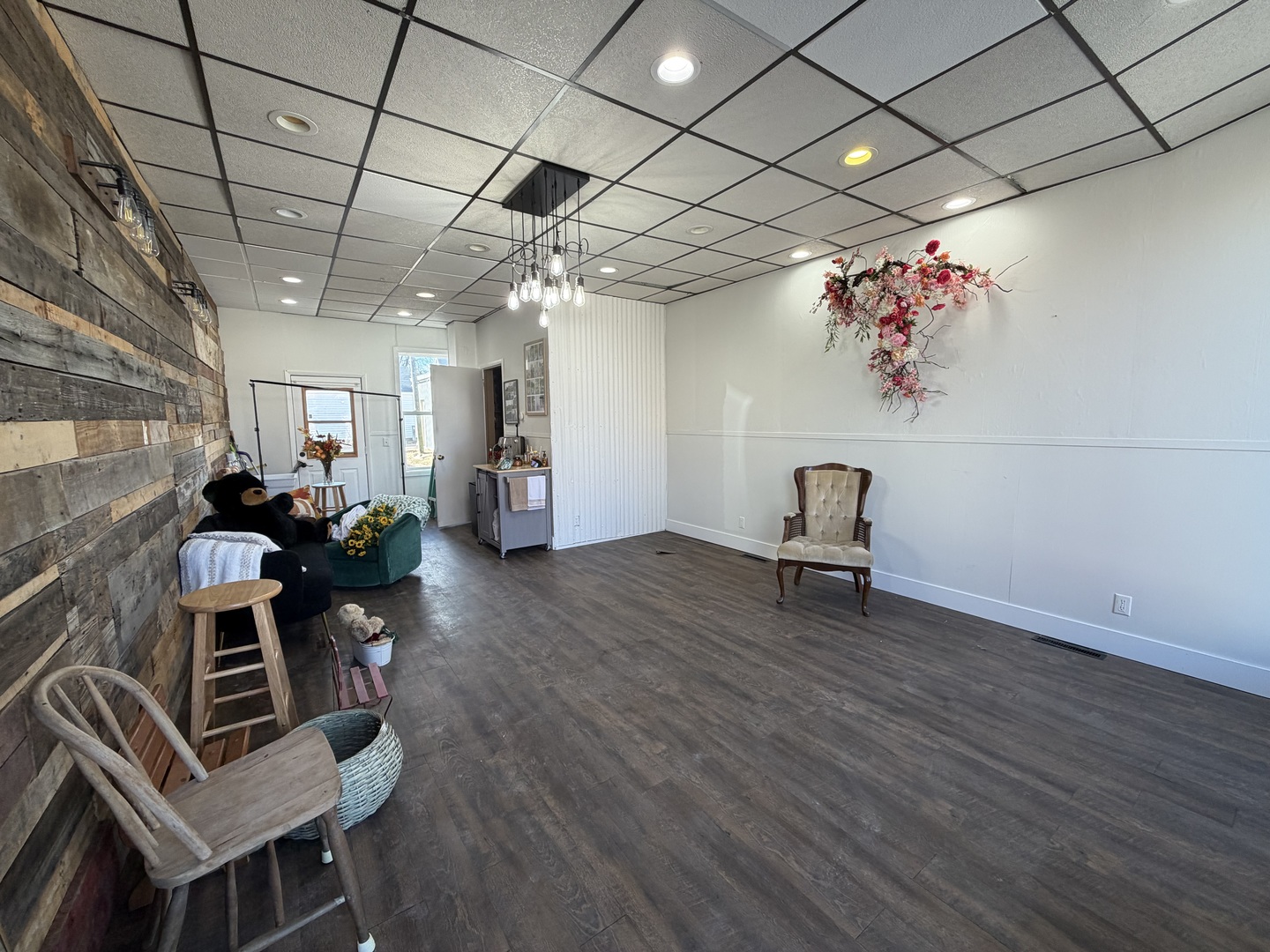 13 East Market Street Shannon, IL 61078 - Photo 6 of 13 a living room with furniture and a wooden floor