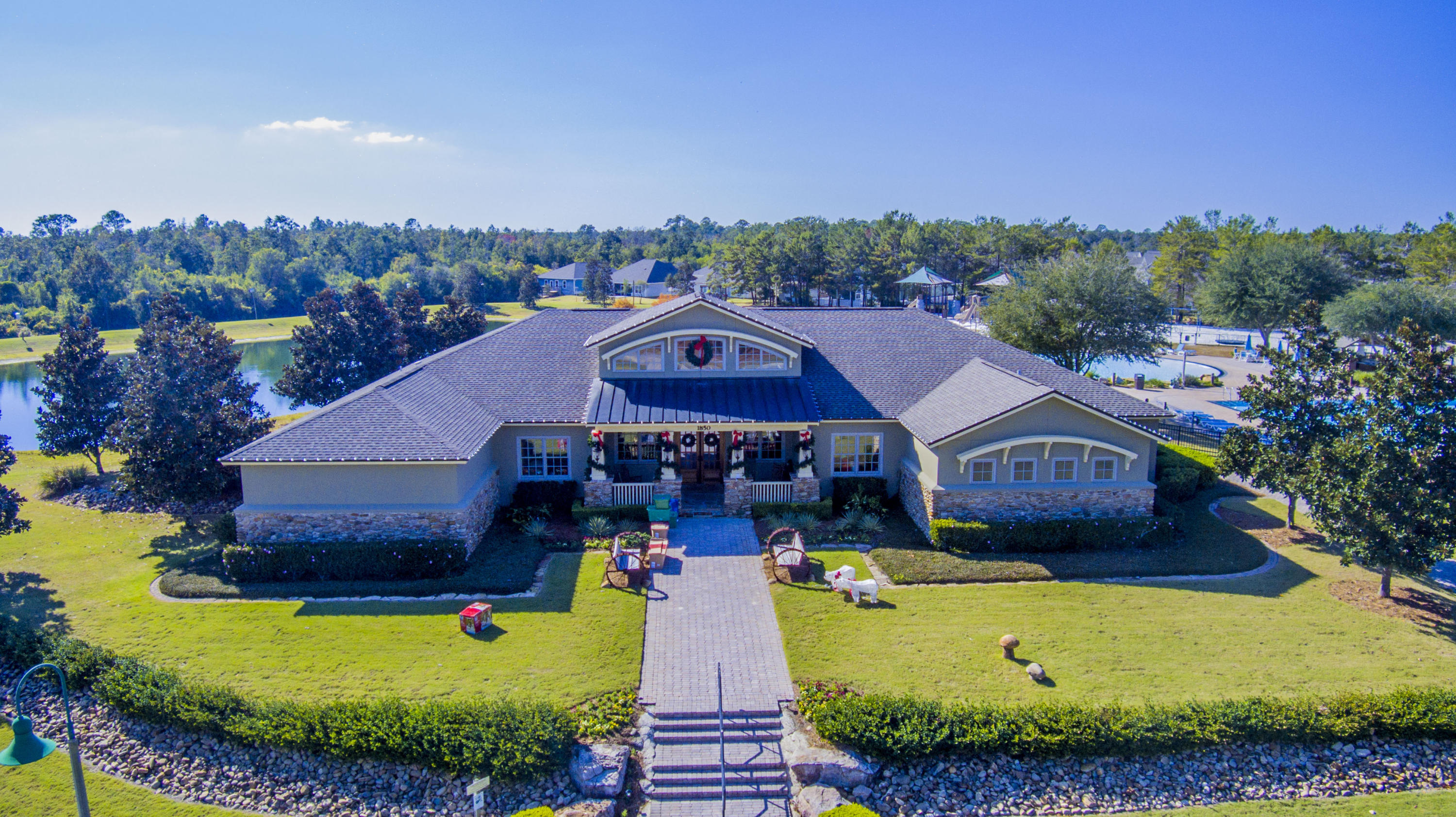 43 Secret Street Freeport, FL 32439 - Photo 66 of 77 a aerial view of a house with swimming pool and big yard