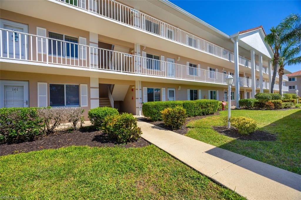 5980 Amherst Drive, Unit D202 Naples, FL 34112 - Photo 2 of 12 View of building exterior
