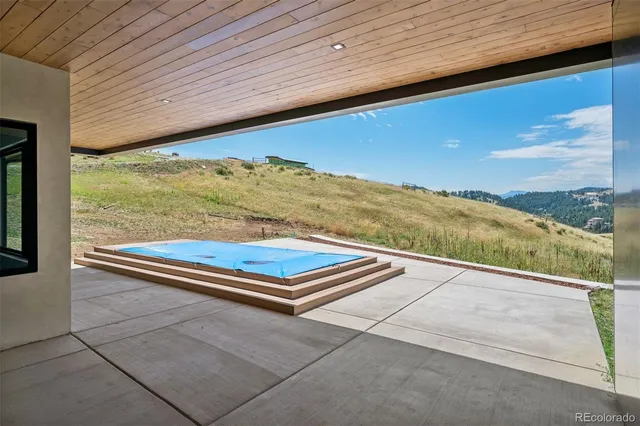 a view of outdoor space with lounge chair