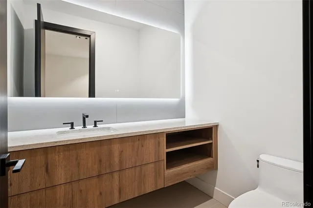 a bathroom with a sink and a toilet