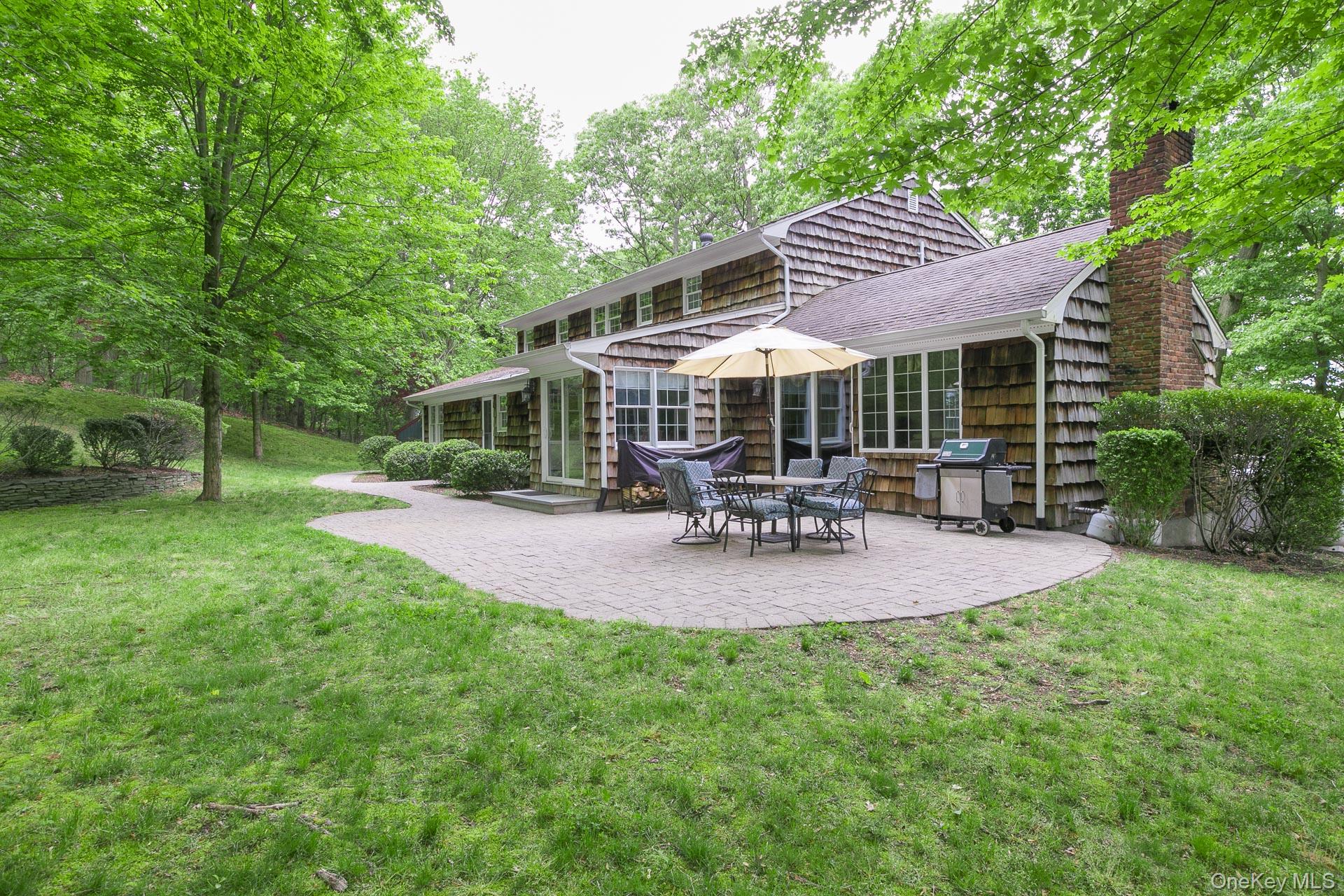 451 River Road Nissequogue, NY 11780 - Photo 24 of 24 a view of outdoor space yard deck patio and swimming pool