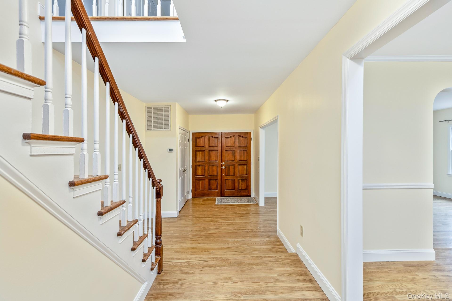 451 River Road Nissequogue, NY 11780 - Photo 5 of 24 a view of an entryway with staircase