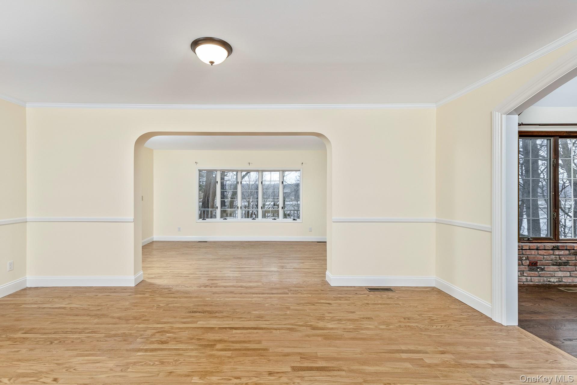 451 River Road Nissequogue, NY 11780 - Photo 7 of 24 a view of empty room with wooden floor