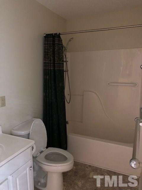920 Seabrook Road Raleigh, NC 27610 - Photo 7 of 9 a bathroom with a toilet and a shower