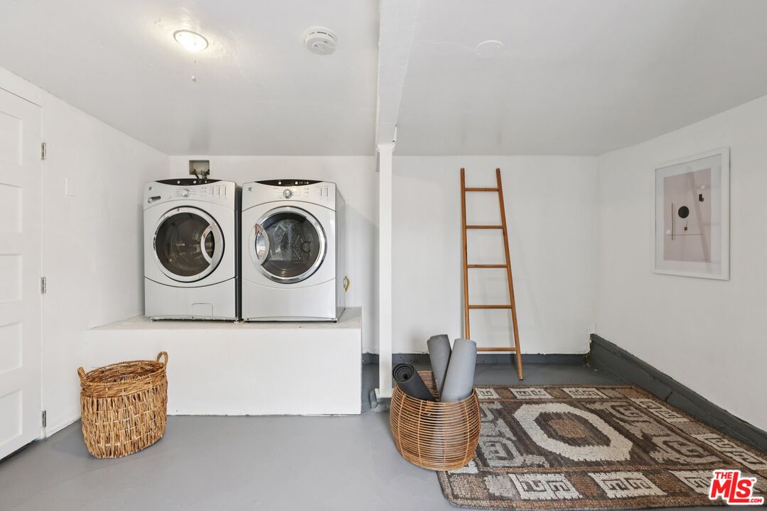 706 Isabel Street Los Angeles, CA 90065 - Photo 19 of 20 a utility room with sink dryer and washer