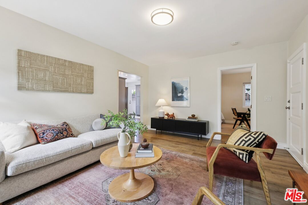 706 Isabel Street Los Angeles, CA 90065 - Photo 4 of 20 a living room with furniture and a wooden floor