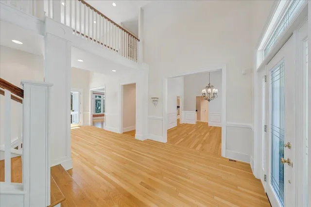 a garden with trees in front of it