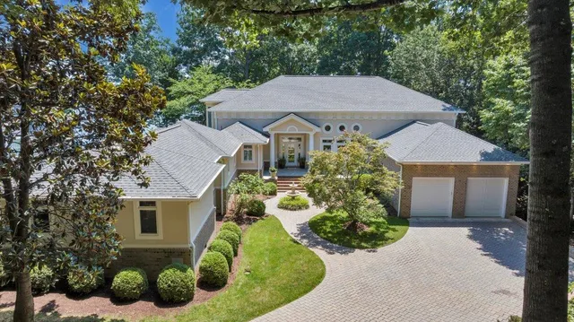 a living room with furniture fireplace and flat screen tv