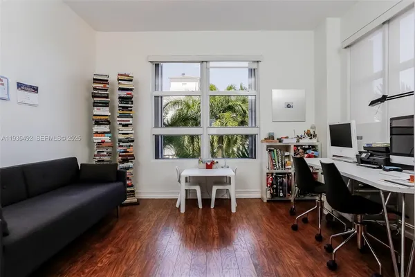 a view of a livingroom with furniture and a living room