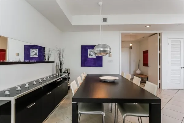 a view of a dining room with furniture