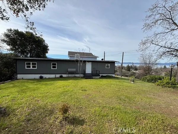 a view of a house with a big yard