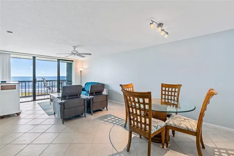 a view of a livingroom with furniture and a table