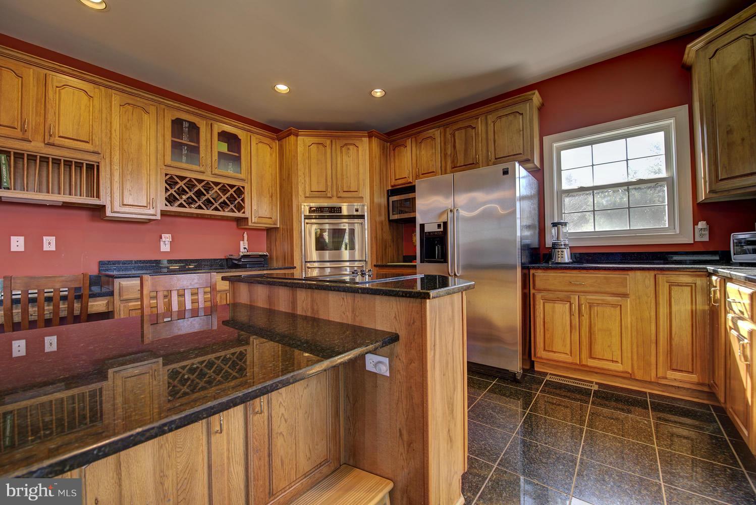 5327 Pond Mountain Road Broad Run, VA 20137 - Photo 11 of 30 Kitchen with desk and over-sized granite Island