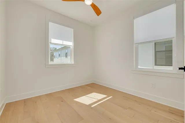 an aerial view of a house with a swimming pool
