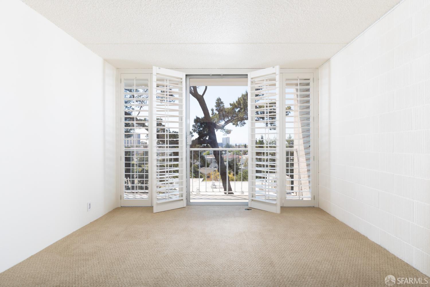 1 Kelton Court, Unit 1E Oakland, CA 94611 - Photo 11 of 23 a view of a room with floor to ceiling window
