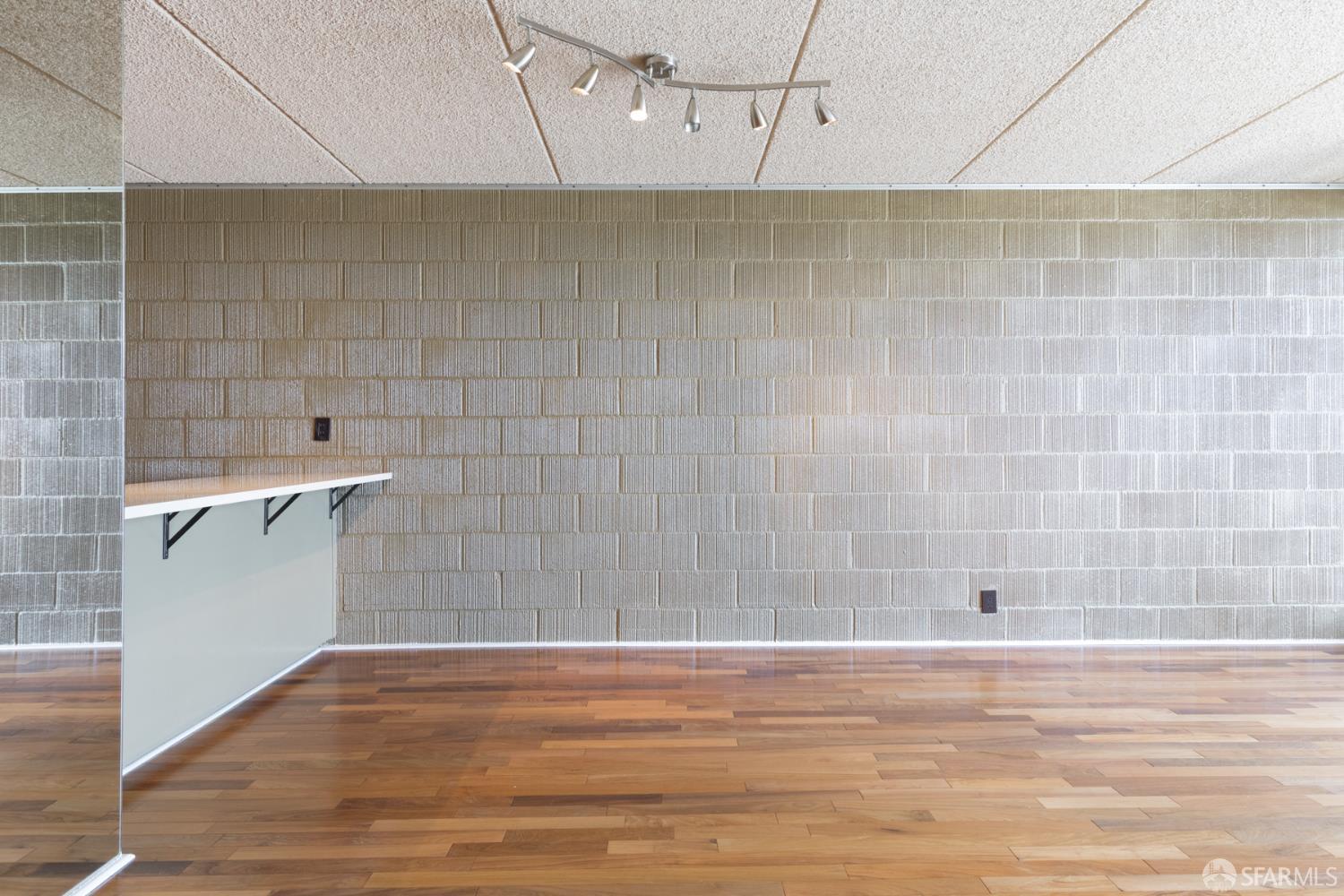 1 Kelton Court, Unit 1E Oakland, CA 94611 - Photo 6 of 23 a bathroom with a bathtub and shower