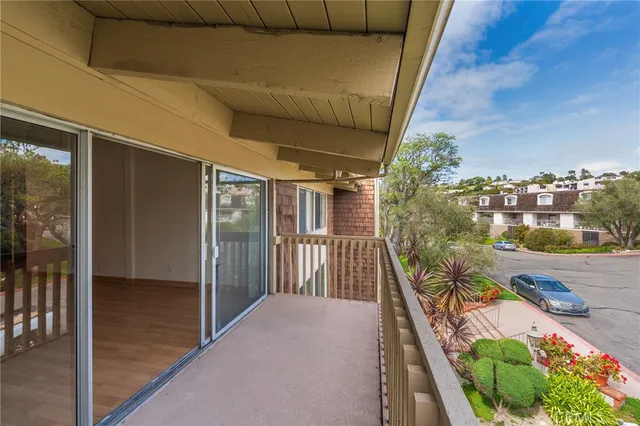 a balcony with an outdoor space