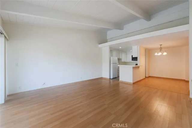 a view of kitchen with wooden floor