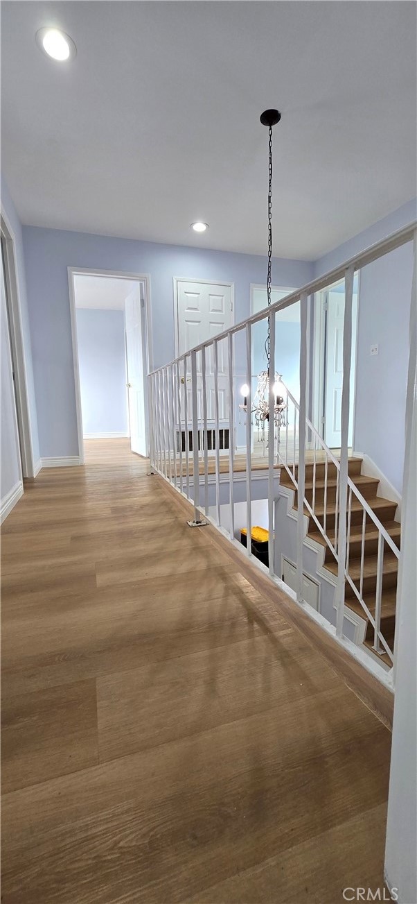 7731 Lehigh Place Westminster, CA 92683 - Photo 32 of 35 Up stair hall way with new wood floor.