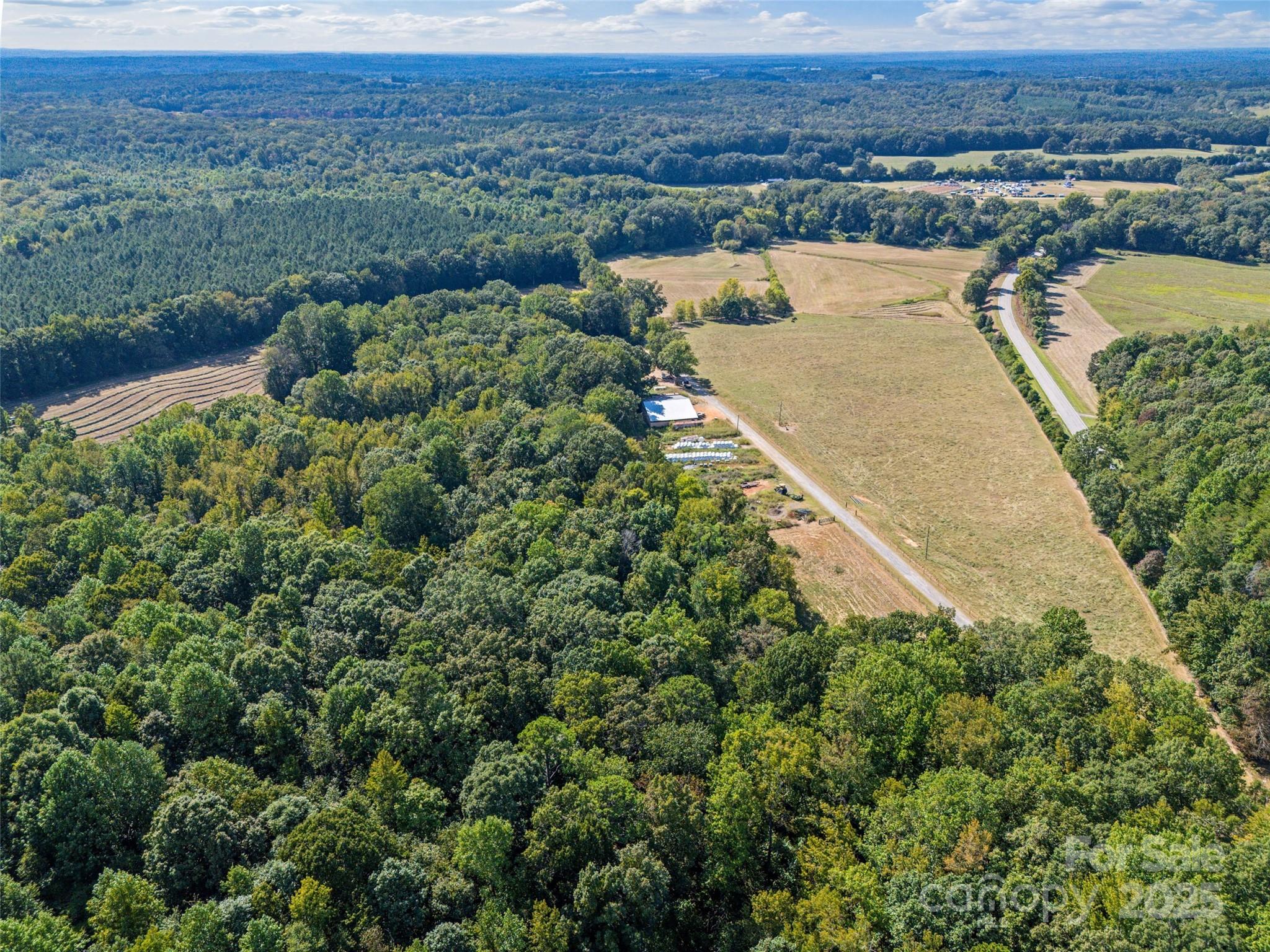 3539 Highway 97 Sharon, SC 29742 - Photo 14 of 19 an aerial view of a house with a yard and lake view