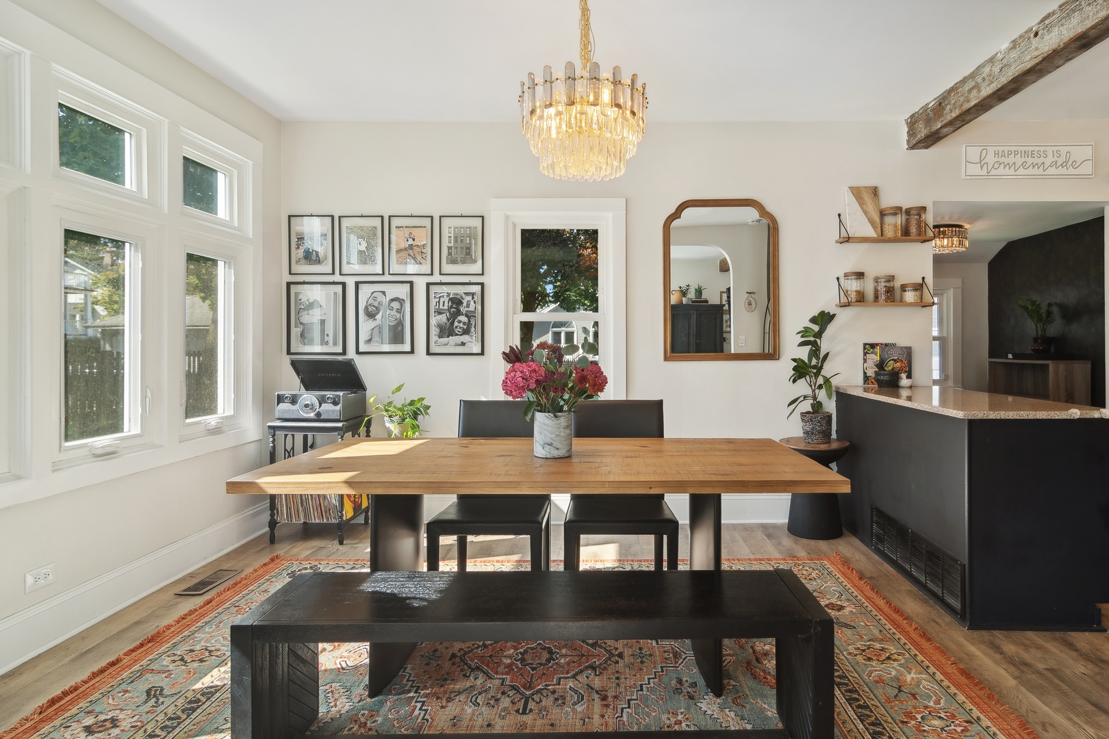 114 Harrison Street Barrington, IL 60010 - Photo 20 of 34 a view of a dining room with furniture a chandelier and wooden floor