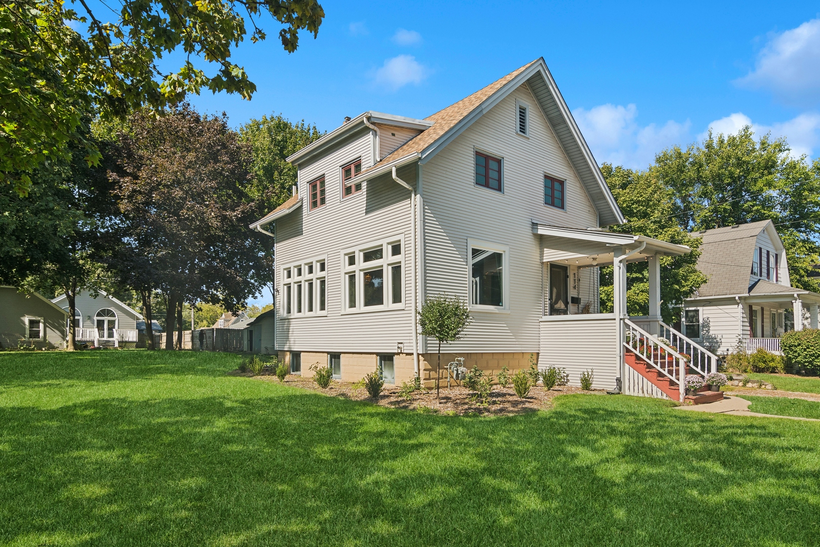 114 Harrison Street Barrington, IL 60010 - Photo 2 of 34 a front view of house with yard and green space