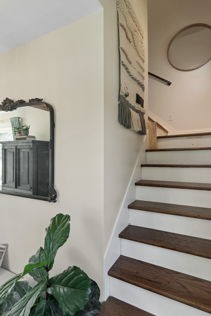 114 Harrison Street Barrington, IL 60010 - Photo 26 of 34 a view of staircase with white walls and a window