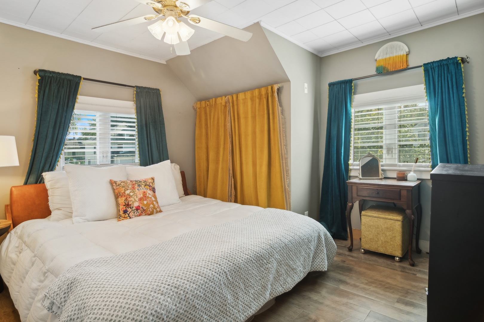 114 Harrison Street Barrington, IL 60010 - Photo 27 of 34 a bedroom with a large bed and a chandelier