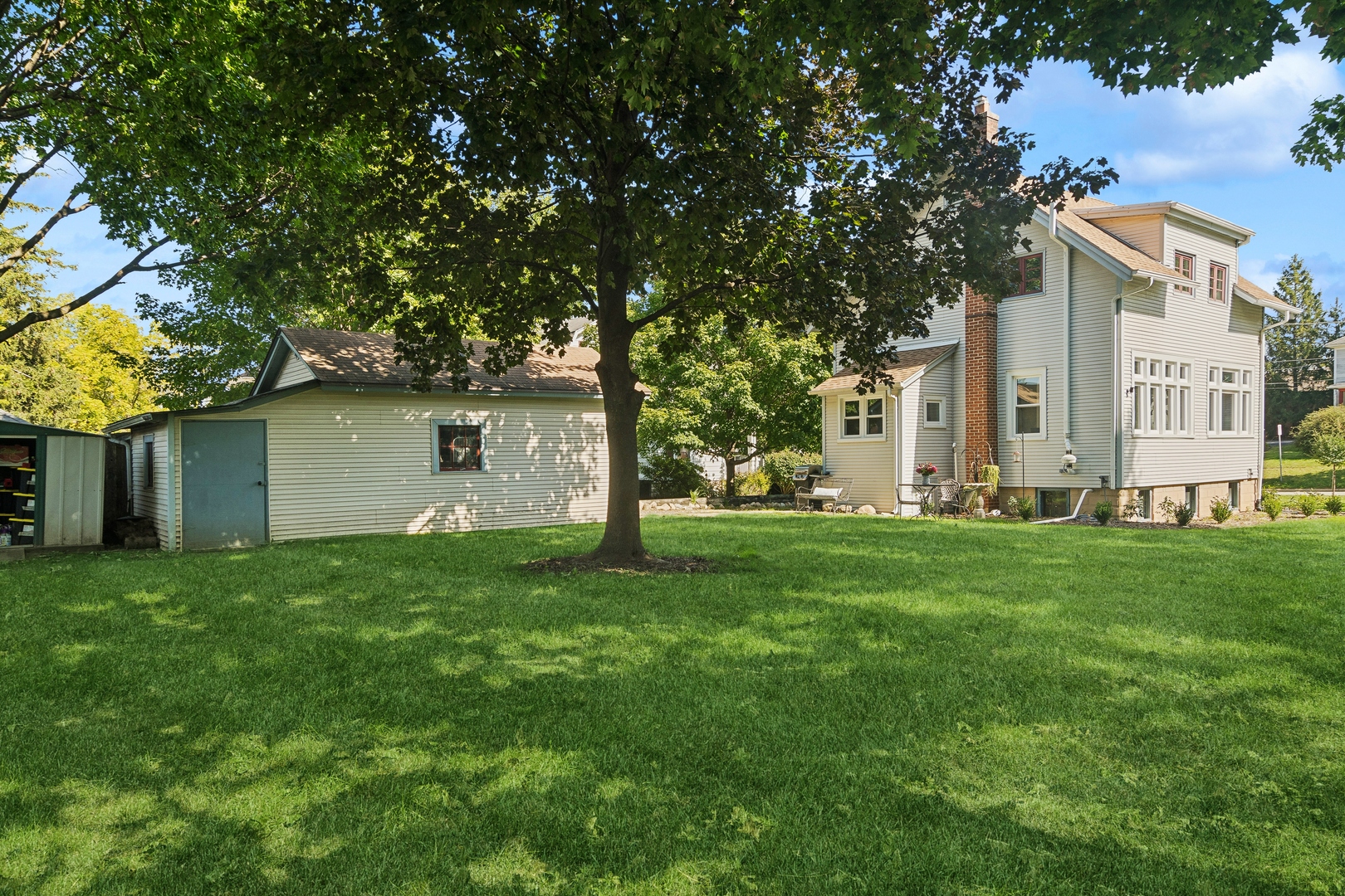 114 Harrison Street Barrington, IL 60010 - Photo 34 of 34 a view of backyard of house with green space