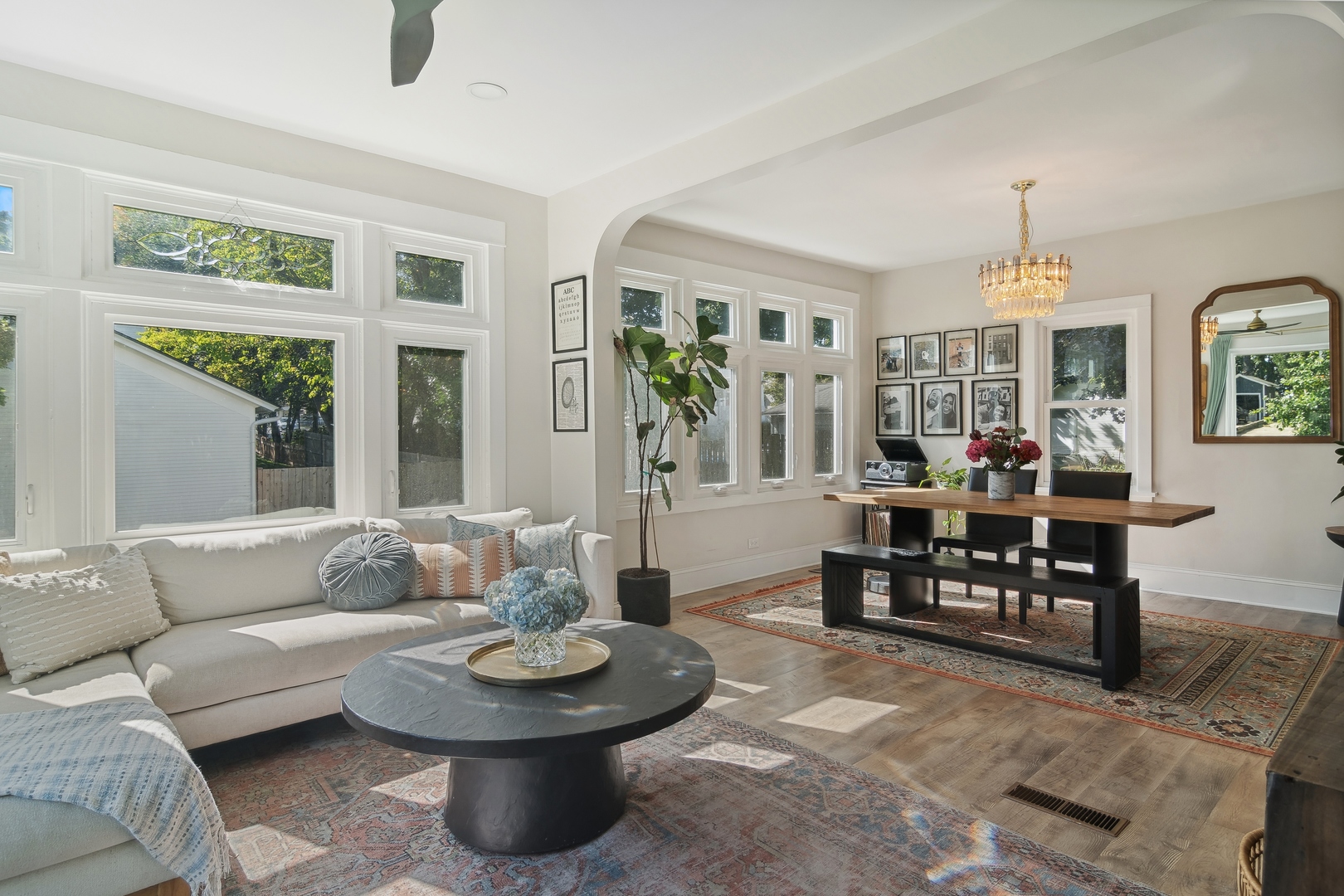 114 Harrison Street Barrington, IL 60010 - Photo 10 of 34 a living room with furniture and a chandelier