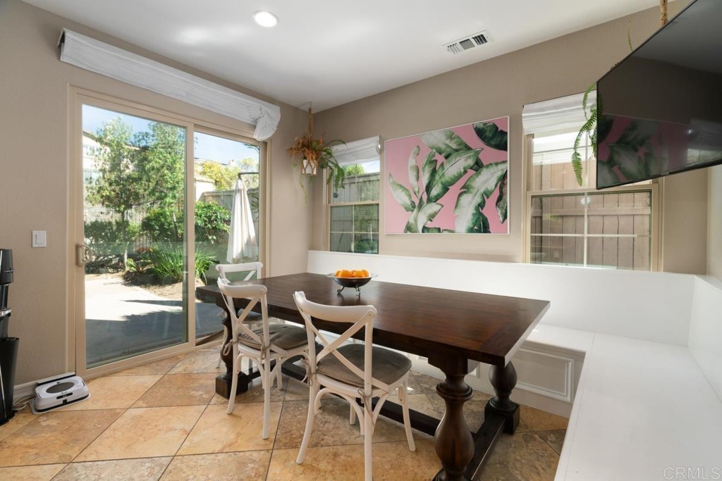 832 Genoa Way San Marcos, CA 92078 - Photo 23 of 42 a view of a dining room with furniture window and outside view