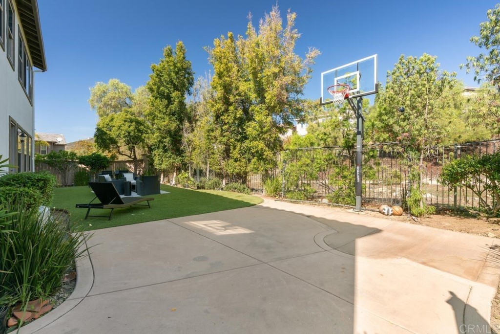 832 Genoa Way San Marcos, CA 92078 - Photo 41 of 42 a view of a street with a building in the background
