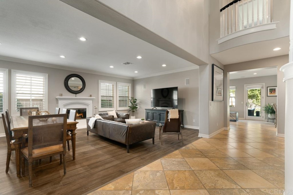 832 Genoa Way San Marcos, CA 92078 - Photo 7 of 42 a living room with fireplace furniture and a large window
