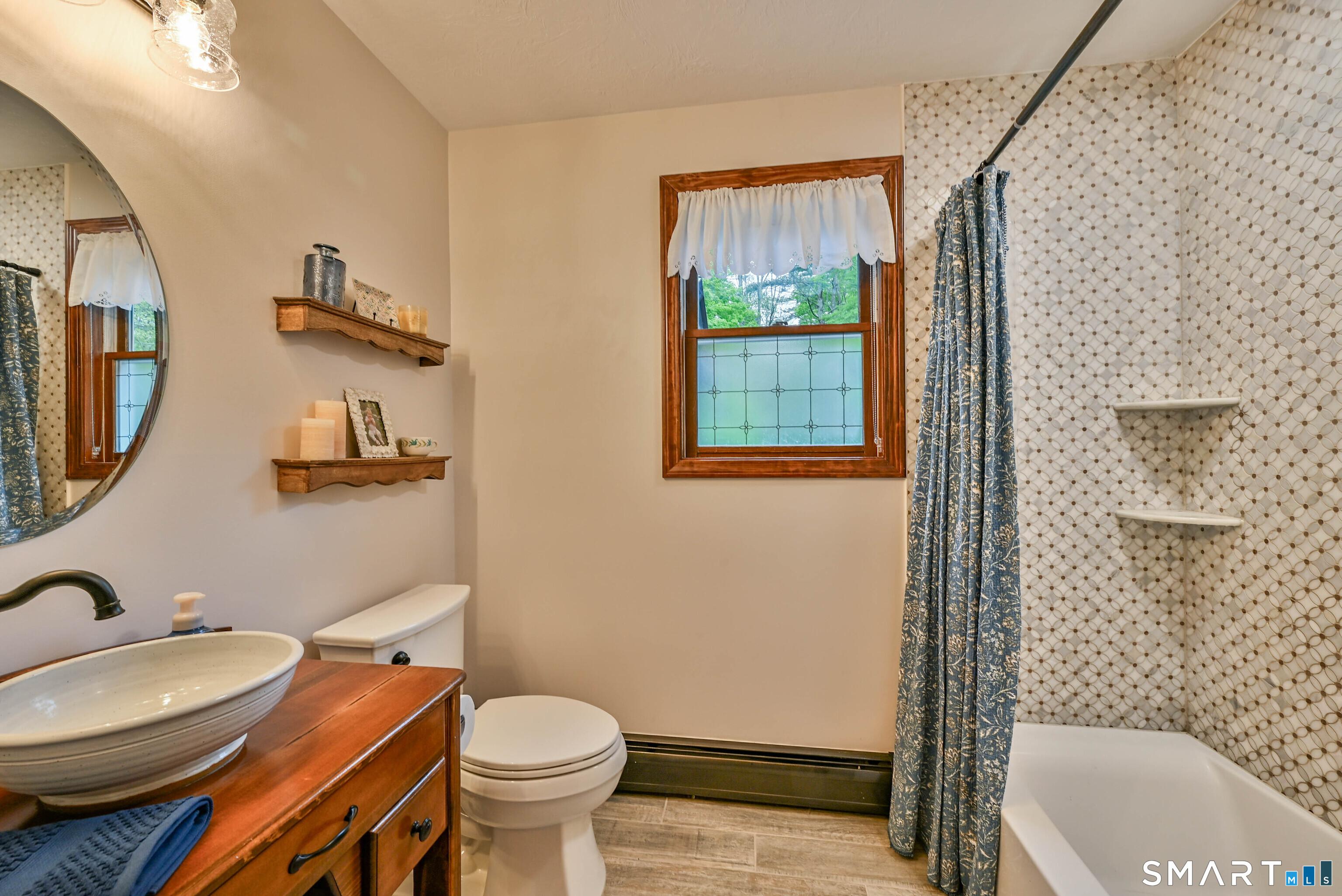 309 O'Leary Road Thompson, CT 06277 - Photo 32 of 40 a bathroom with a sink toilet and shower