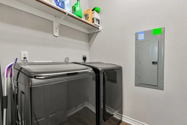 a utility room with dryer and washer