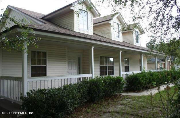 97089 Castle Ridge Drive Yulee, FL 32097 - Photo 3 of 9 front view of a house