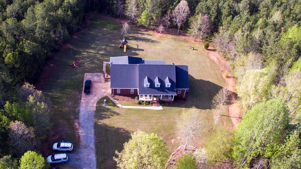 88 Lower Simmons Road Macon, GA 31220 - Photo 2 of 43 a view of a house with a yard