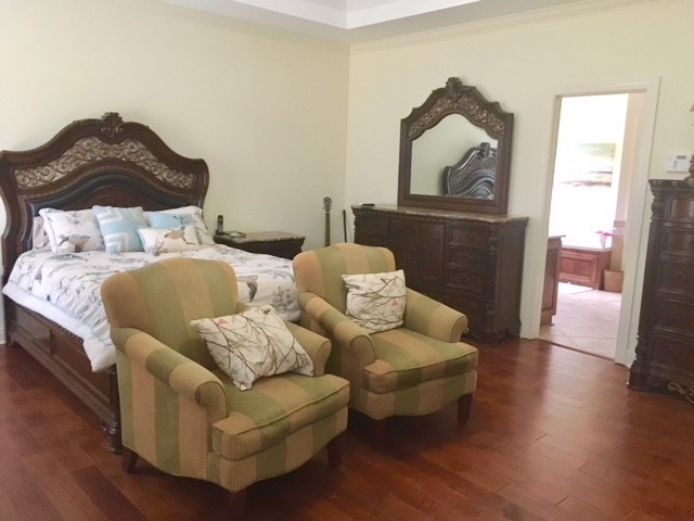 88 Lower Simmons Road Macon, GA 31220 - Photo 13 of 43 a living room with furniture and a wooden floor