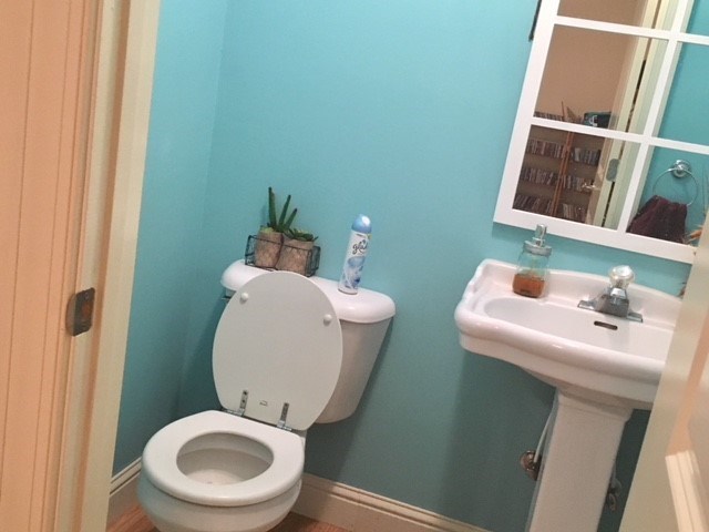 88 Lower Simmons Road Macon, GA 31220 - Photo 20 of 43 a bathroom with a toilet sink and mirror