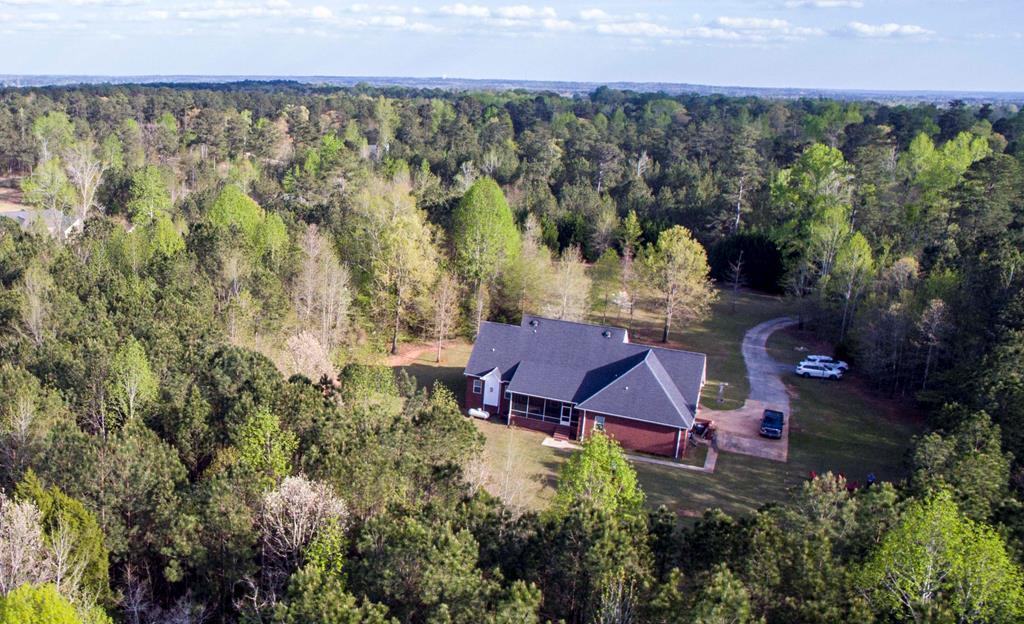 88 Lower Simmons Road Macon, GA 31220 - Photo 3 of 43 an aerial view of a house with a yard