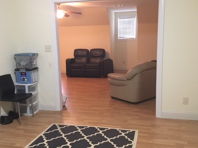 88 Lower Simmons Road Macon, GA 31220 - Photo 21 of 43 a living room with furniture and a rug