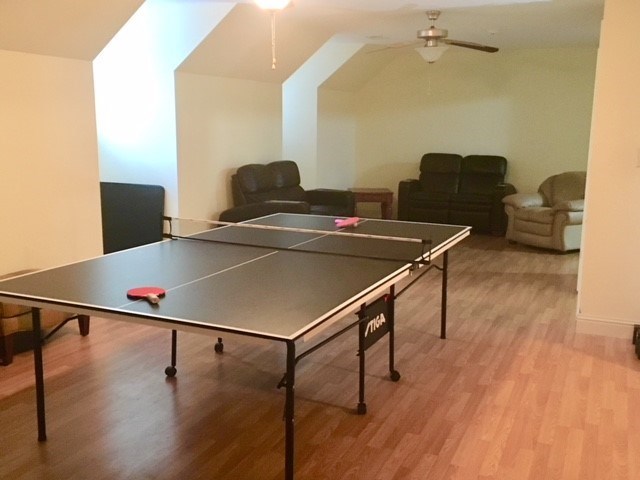 88 Lower Simmons Road Macon, GA 31220 - Photo 22 of 43 a room with furniture and wooden floor