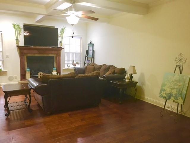 88 Lower Simmons Road Macon, GA 31220 - Photo 30 of 43 a living room with furniture and a fireplace