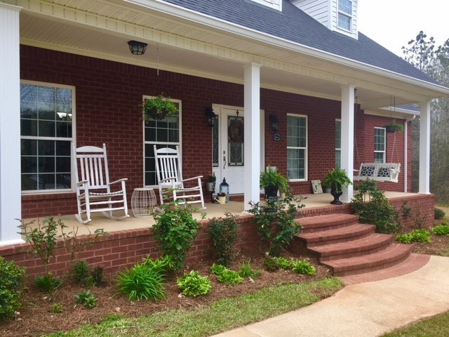 88 Lower Simmons Road Macon, GA 31220 - Photo 4 of 43 a front view of a house with garden and plants