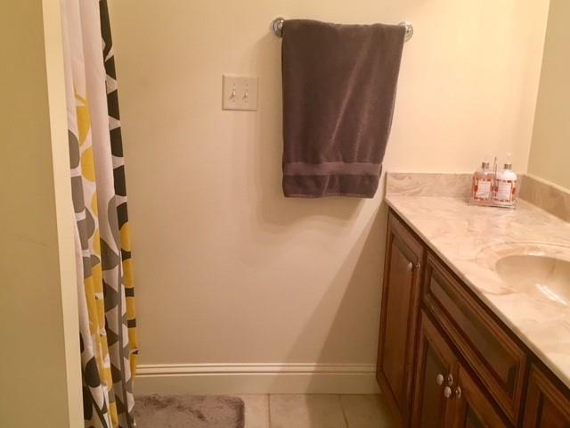 88 Lower Simmons Road Macon, GA 31220 - Photo 34 of 43 a bathroom with a granite countertop sink and a mirror