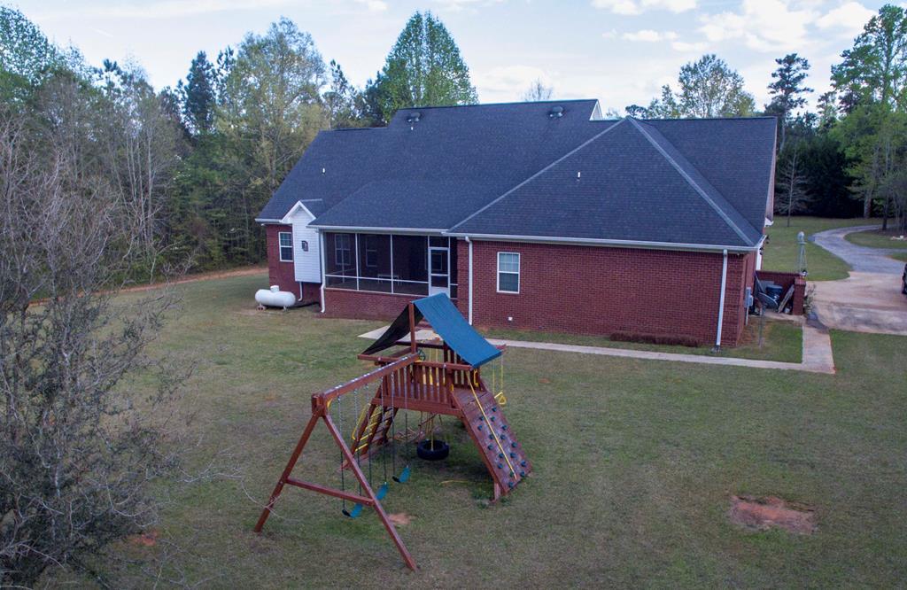 88 Lower Simmons Road Macon, GA 31220 - Photo 42 of 43 a house that has sitting area in backyard