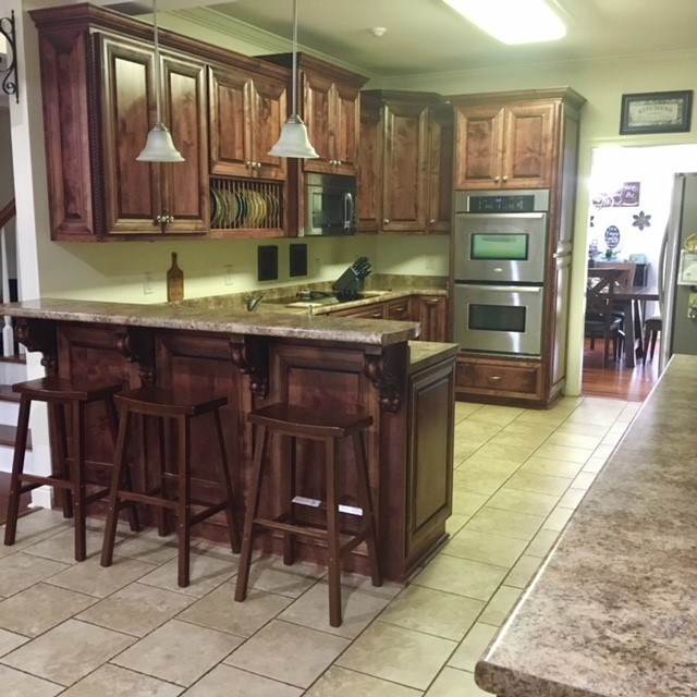 88 Lower Simmons Road Macon, GA 31220 - Photo 9 of 43 a kitchen with a sink and cabinets