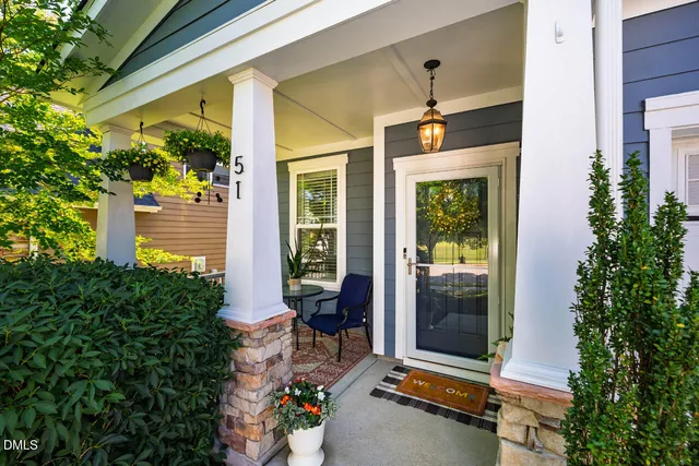 a front view of a house with a porch