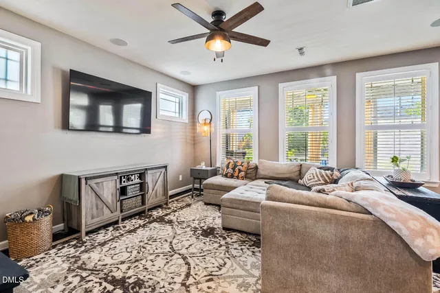 a kitchen with stainless steel appliances granite countertop a stove and a microwave